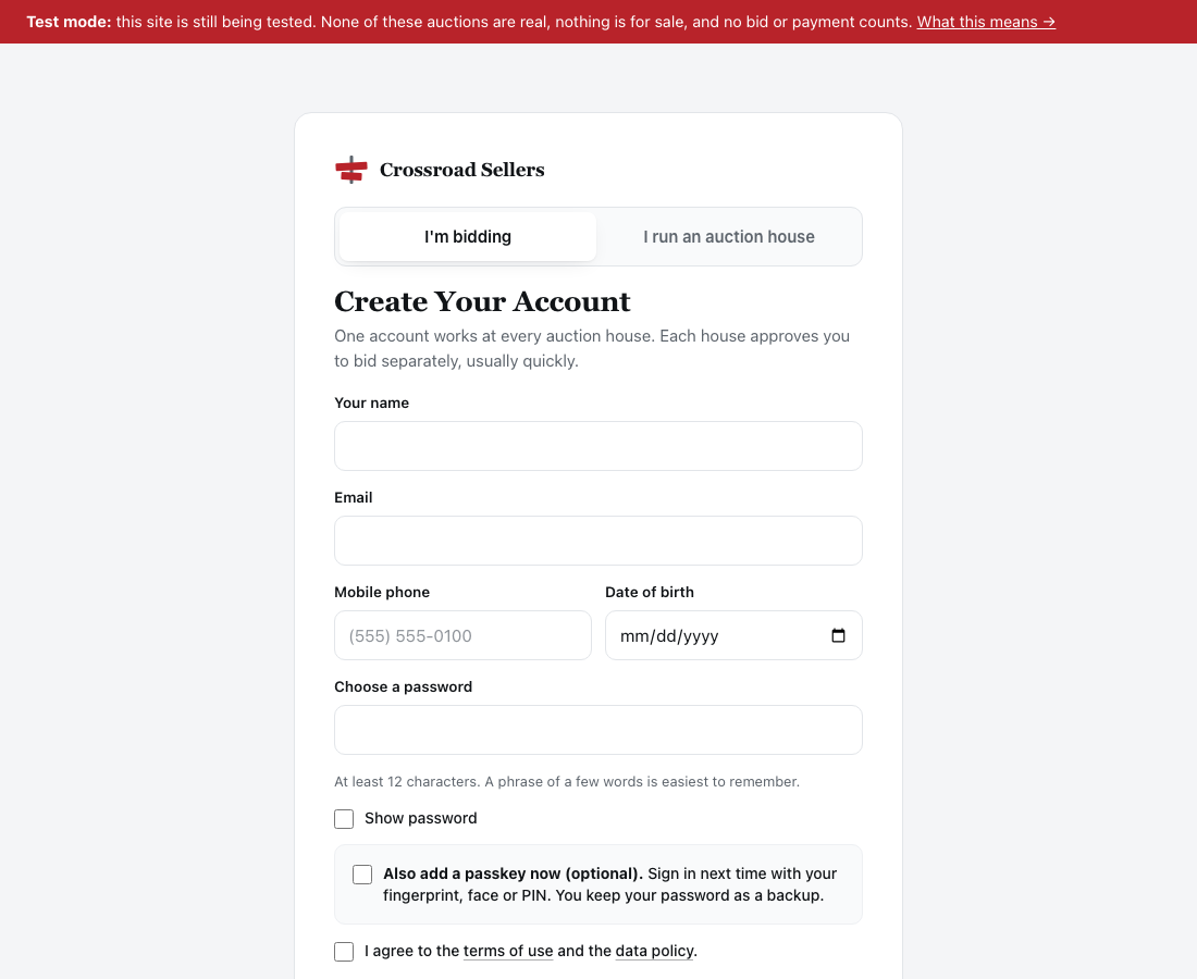 The Create Your Account form: name, email, mobile phone, date of birth and a password, with the optional passkey box and the terms tick box